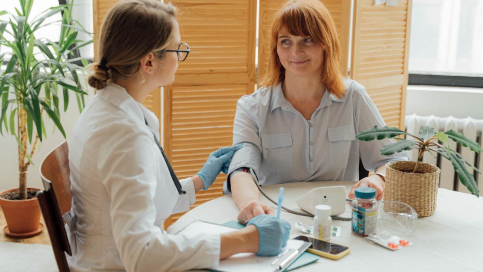 Patient talking with her doctor