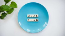 Meal Plan written in Scrabble word on a plate