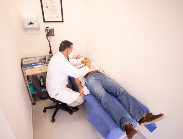 Patient in consultation with his doctor