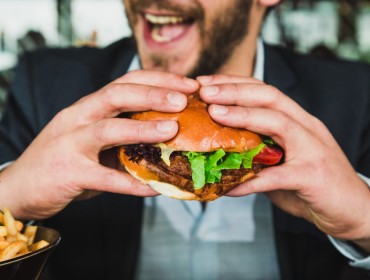 A man eating a burger