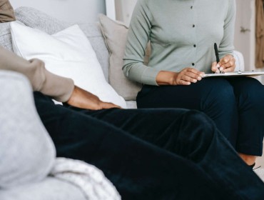 A patient and a coach in a therapy session