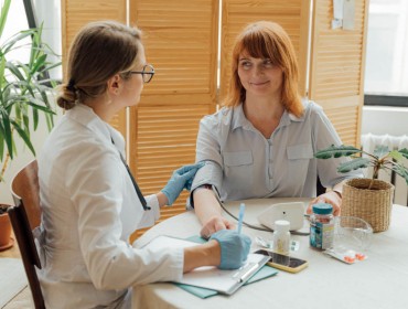 Patient talking with her doctor